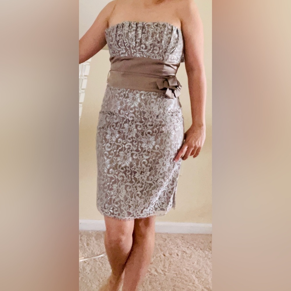 Attractive dress in a beautiful beige/brown/gold color size 2
